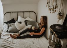 woman bed coffee